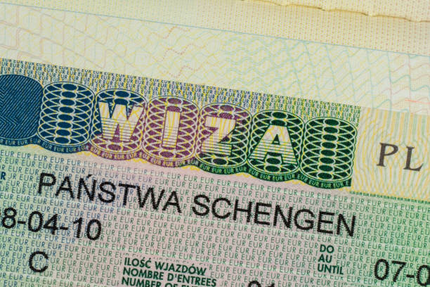 istock Schengen visa in the passport close-up. 1419923682