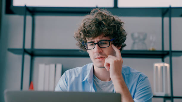 istock Young Adult Man Giving an Energized Presentation during Online Class. 1419924324