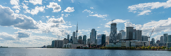 View of Downtown Toronto skyline with the CN Tower and the Financial District skyscrapers at sunset.