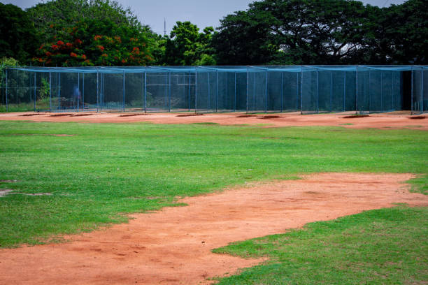 istock Set of nets for cricket game practice. Playground with nets for cricket coaching and training. 1419931412