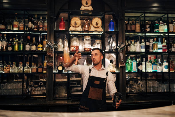 istock Before the party starts in the bar, the bartender makes cocktails 1419948848
