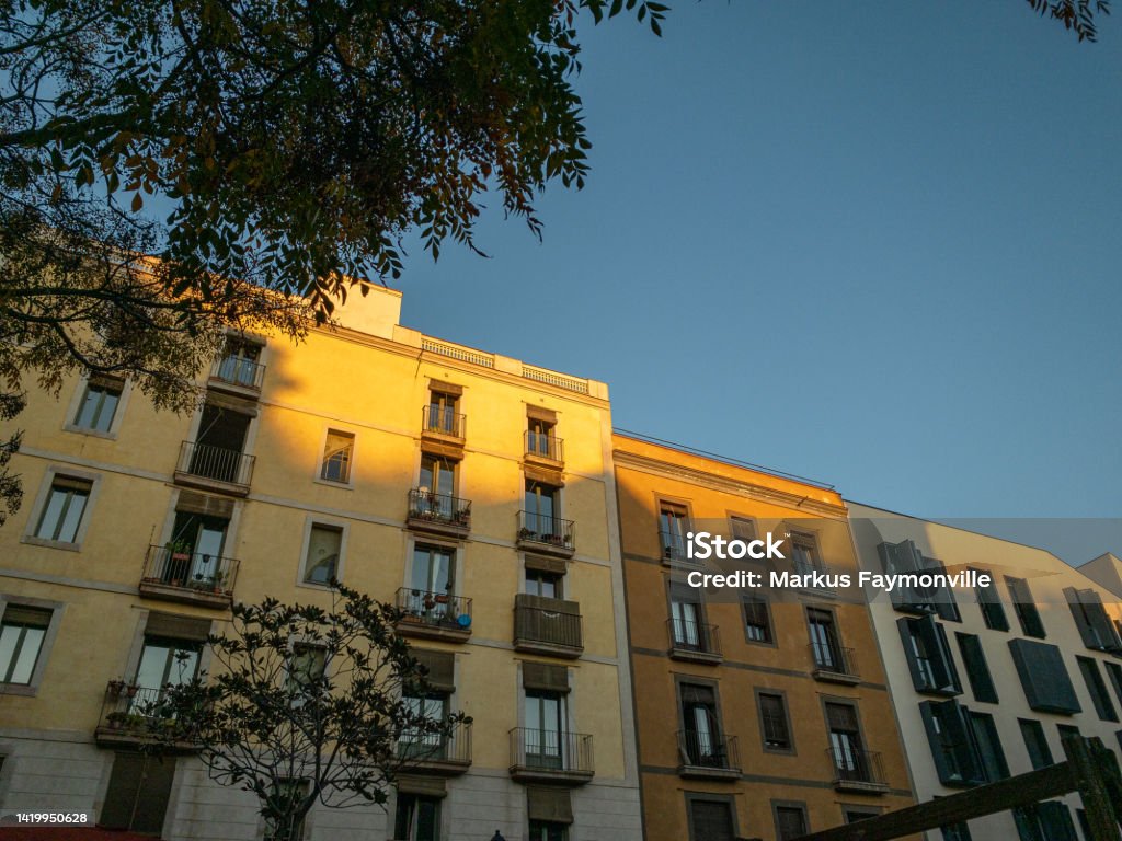 Low angle view of historical inner city spanish city house facades City Stock Photo