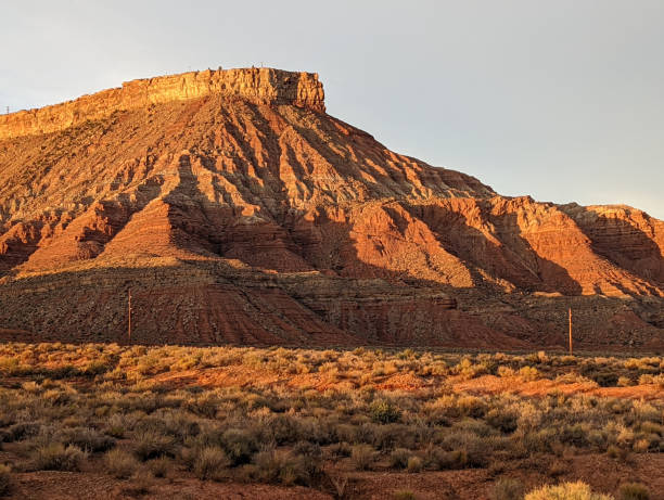 istock Late afternoon sunset light and shadow on Hurricane Mesa above Virgin Utah highlighting the desert landscape and vegetation near the historic pioneer corral 1419953575