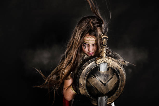 Little girl wearing a gladiator halloween costume