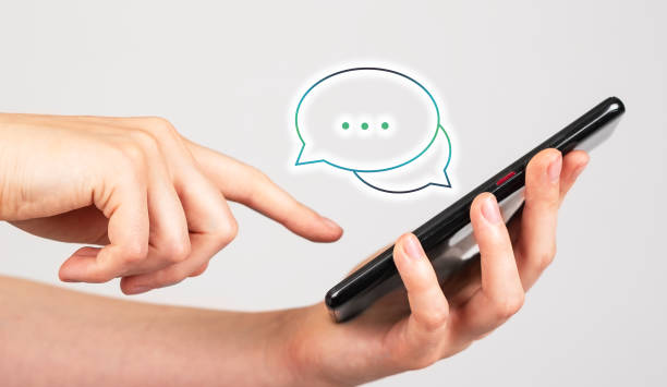 istock Forefinger swiping positive comments on phone. Consumer, client satisfaction. Good feedback on social media. Woman holding smartphone and reading messages 1419959471
