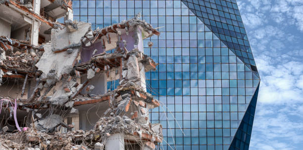 istock ruined house in front of modern skyscraper 1419960265