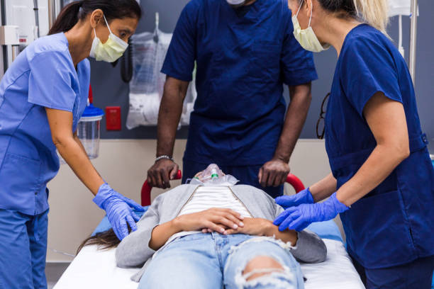 istock Unconscious young woman brought into ER 1419962829
