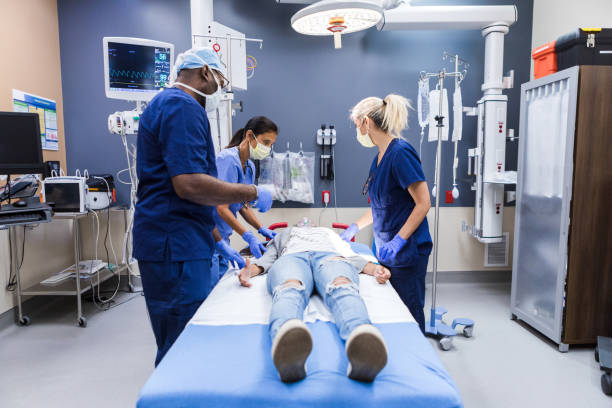 istock Diverse ER team jumps into action when patient loses consciousness 1419962943