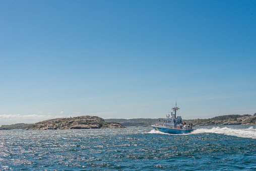 Gothenburg, Sweden - May 31 2015: Swedish coast guard KBV 303 outside Grebbestad.