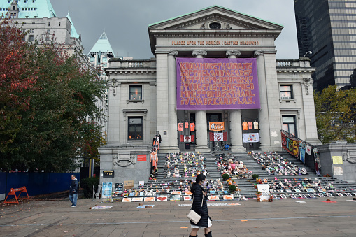 Scenery Of Vancouver Art Gallery In British Columbia Canada, People, Children's Boots And Shoes On The Ground As A Memorial For All The Dead first Nations Children