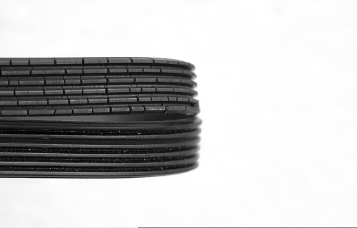 old and new timing belts comparison. Isolated car parts on white background. Copy space for carshop banner.