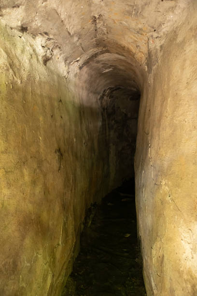 Old narrow underground passage stock photo