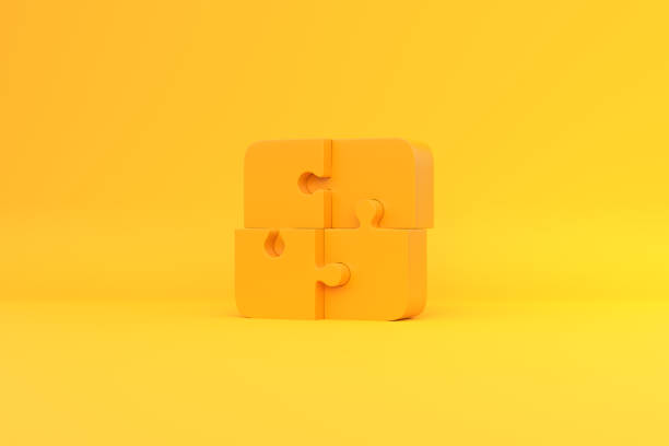 istock United four puzzles on a yellow background 1419981516
