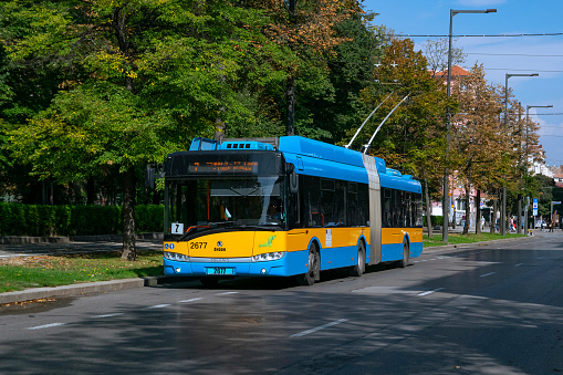 Sofia, Bulgaria - 26th September, 2019: Trolleybus Škoda 27Tr Solaris driving on a street. This model is one of the most popular trolleybuses in Europe.