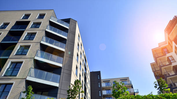 istock Modern apartment buildings on a sunny day with a blue sky 1419987999