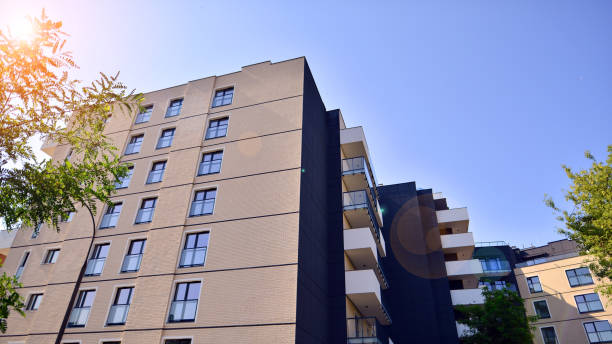 istock Modern apartment buildings on a sunny day with a blue sky 1419988023