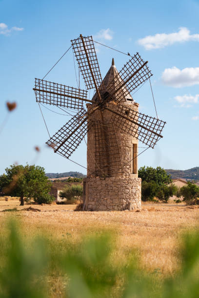 balearic islands windmill at sunset in Formentera La Mola