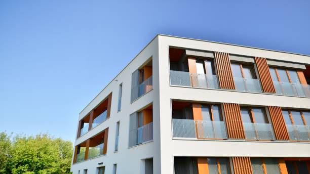 istock Modern apartment buildings on a sunny day with a blue sky 1419989249