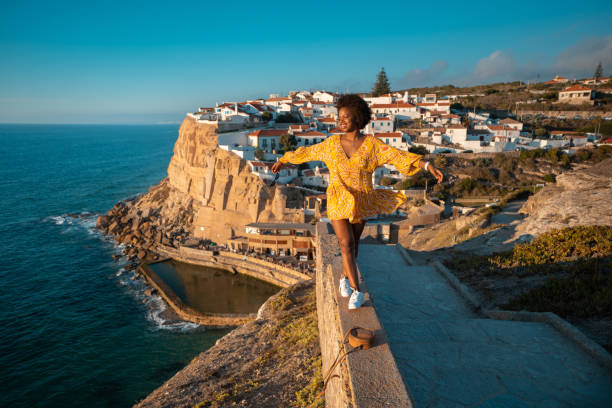 Tourist enjoying vacation in Azenhas do Mar