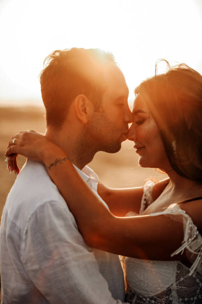 istock Romantic Bride And Groom At Sunset 1419994247