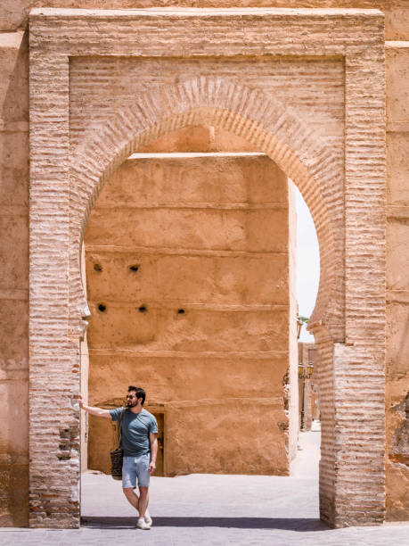 istock Man leaning on an archway in morocco 1419996239