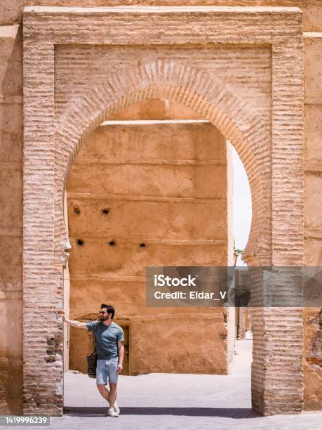 Man Leaning On An Archway In Morocco Stock Photo - Download Image Now - Admiration, Adult, Adults Only