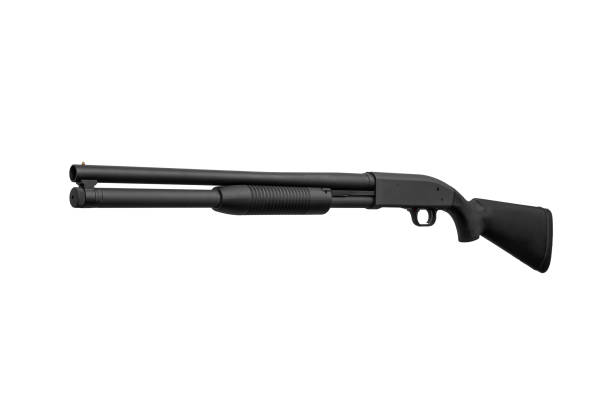 istock Pump-action 12 gauge shotgun isolated on a white background. A smooth-bore weapon with a plastic stock. 1420002099