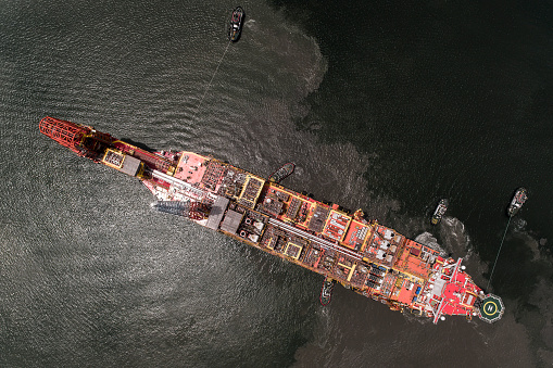 Aerial top down shot of crude oil production vessel