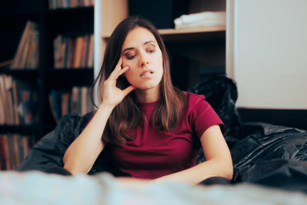 istock Stressed Woman Feeling Nostalgic about Throwing Away Old Things 1420008557