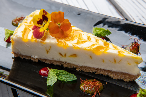 Goldenberry Swirled Cheesecake: 
Saffron infused Goldenberry Gelee, Strawberry Mint Gelee, Mint