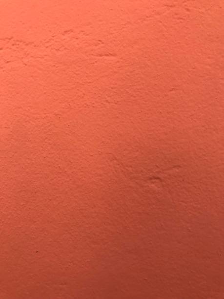 colore arancione - orange wall textured paint foto e immagini stock