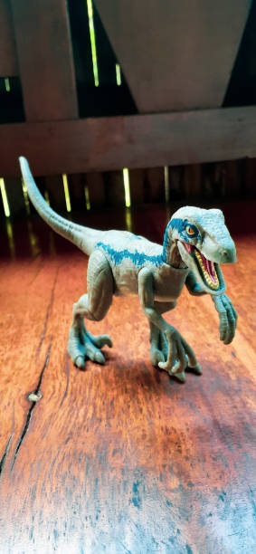 istock Velociraptor dinosaur toy 1420015723