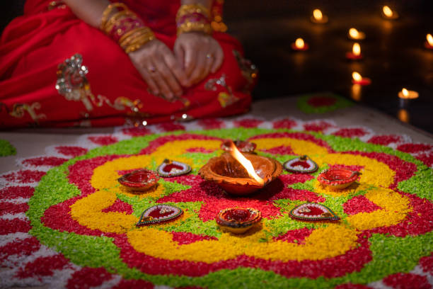 istock Traditional diya lamps lit during diwali celebration 1420020897