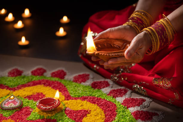 istock Traditional diya lamps lit during diwali celebration 1420020901