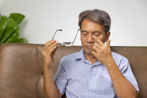 istock Senior asian man has eyestrain and fatigue 1420020903