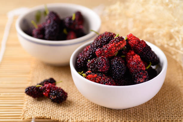 istock Mulberry fruit in bowl, Healthy fruit 1420023656