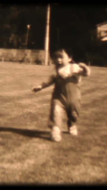 60's 8mm footage - Baby's waddling steps