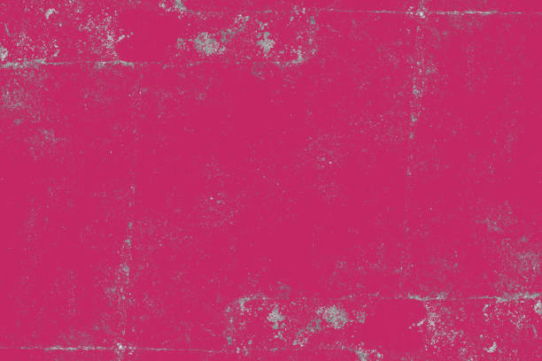 Pink color damaged paint on an old concrete wall for texture background