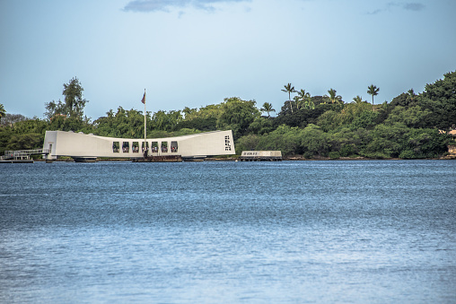 Pearl Harbor, USA - April 1st, 2022: USS Arizona Memorial - National historic sites at Pearl Harbor tell the story of the battle that plunged US into World War II.