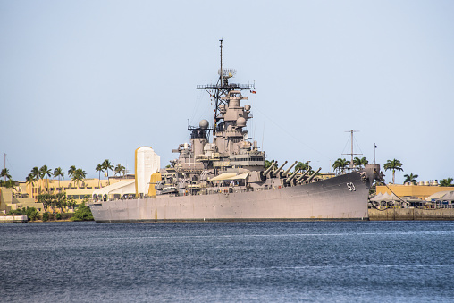 Pearl Harbor, USA - April 1st, 2022: USS Missouri and Ford Island. National historic sites at Pearl Harbor tell the story of the battle that plunged US into World War II.