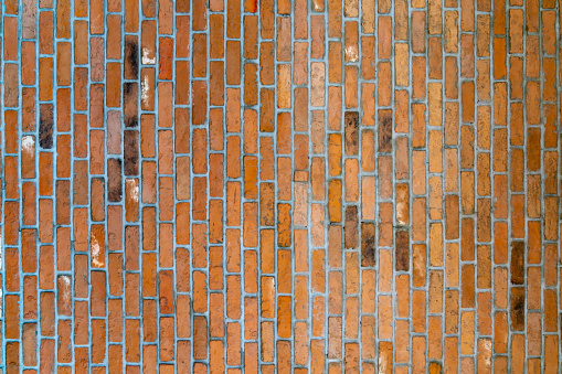 Brick wall wallpaper texture clinker and concrete pattern in old vintage red and brown colour theme under the constuction area