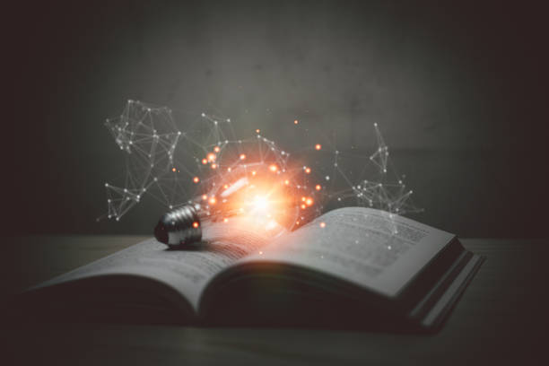 istock Idea creativity innovation inspiration strategy solution success business concept. light bulb on book at table. 1420035551
