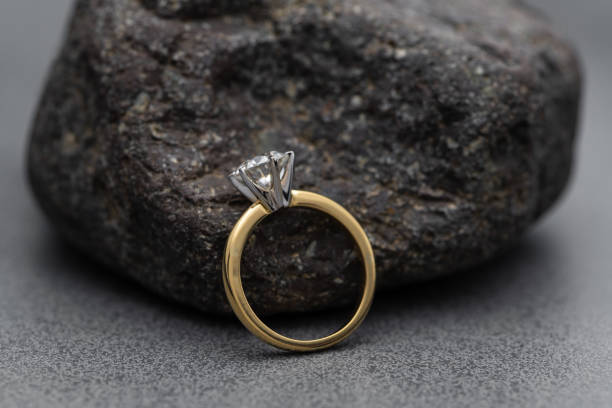 istock Luxury Engagement Diamond Ring on Natural Stone 1420036278