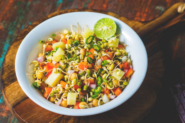 healthy sprout salad with mung bean sprout,chopped onion,tomato and boiled potato. healthy sprout salad with mung bean sprout,chopped onion,tomato and boiled potato. red mung bean stock pictures, royalty-free photos & images