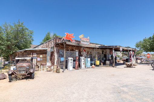 Austin, Texas – June 20, 2021: An old abandoned Texaco gas station in Rural Texas outside of Austin city limits. Photo taken during a warm summer day.