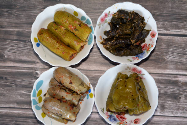 istock Stuffed squash zucchini Mahshi, eggplants, wrapped grape leaves and bell peppers filled with white rice, onion, parsley, dill and coriander,  Arabic Egyptian traditional cuisine of Mahshy 1420047265