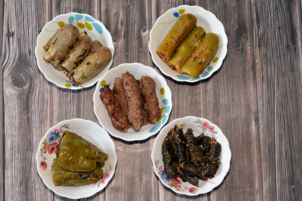 istock Stuffed squash zucchini Mahshi, eggplants, wrapped grape leaves, bell peppers filled with white rice, onion, parsley, dill and coriander and food beef  Kofta, kebab and tarb kofta which is minced meat 1420047412