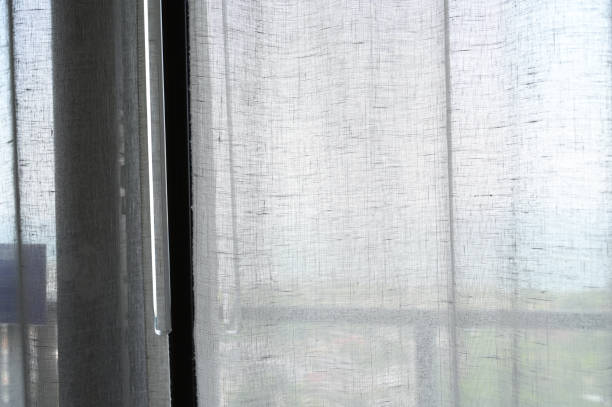 istock white curtain in room with light nature, interior design 1420048691