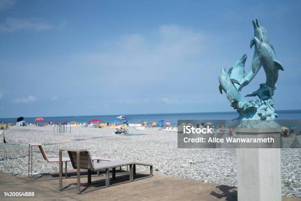 Dolphin Model And Relax Chair In The Public Road Black Sea Coast Line New Boulevard Batumi Adjara Georgia 22 August 2022 Stock Photo - Download Image Now