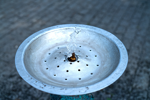 A runing water fountain.